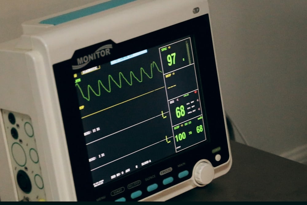 Clinical monitoring equipment in a care setting.